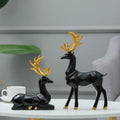 Casal de Renas Decorativas em Resina com Acabamento Polido: Escultura Geométrica para Sala, Estante e Aparador