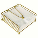 Suporte de guardanapos moderno em ferro da Angel & Home, com design elegante e acabamento resistente.